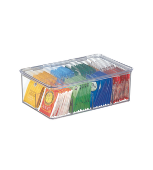 Teebeutelbox enthält bunte Teebeutel, sortiert und ordentlich auf transparentem Kunststoff.